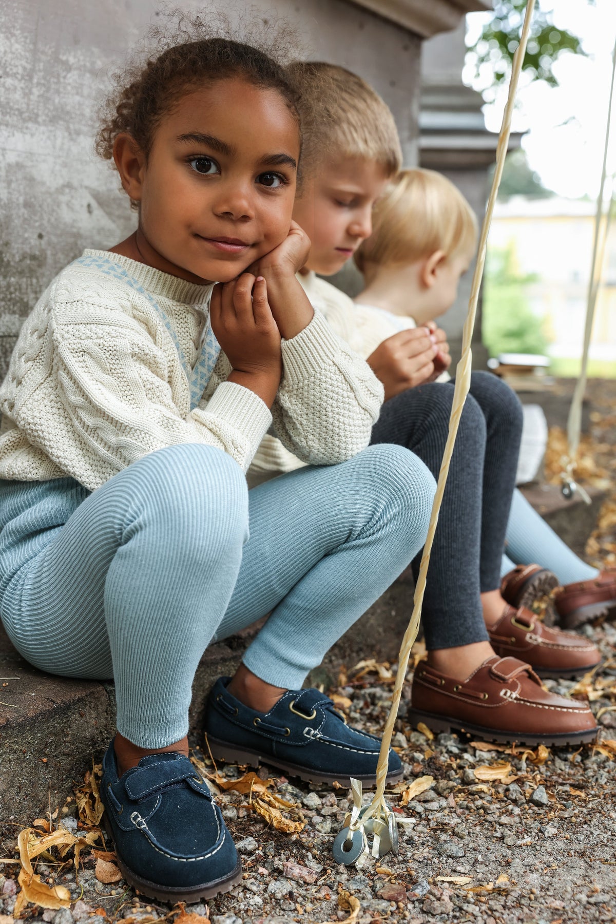 Silly Silas Seated view of Misty Blue ribbed footless tights