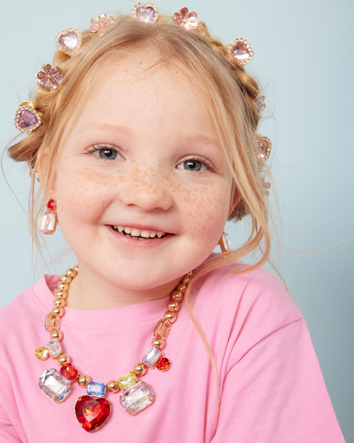 Child wearing Super Smalls Red Carpet Mega Jewelry Set