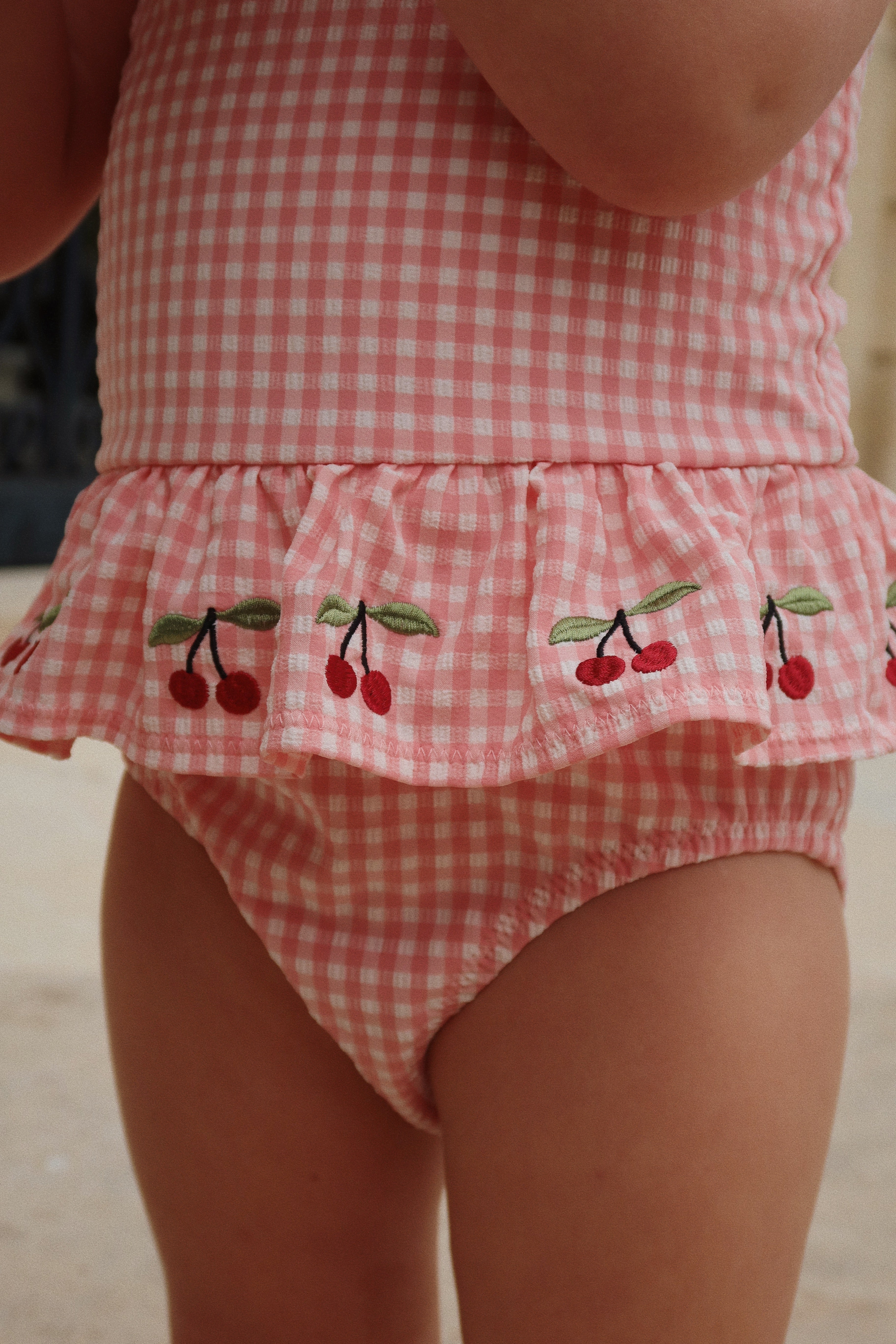 Geranium pink seersucker girls swimsuit by Konges Sløjd