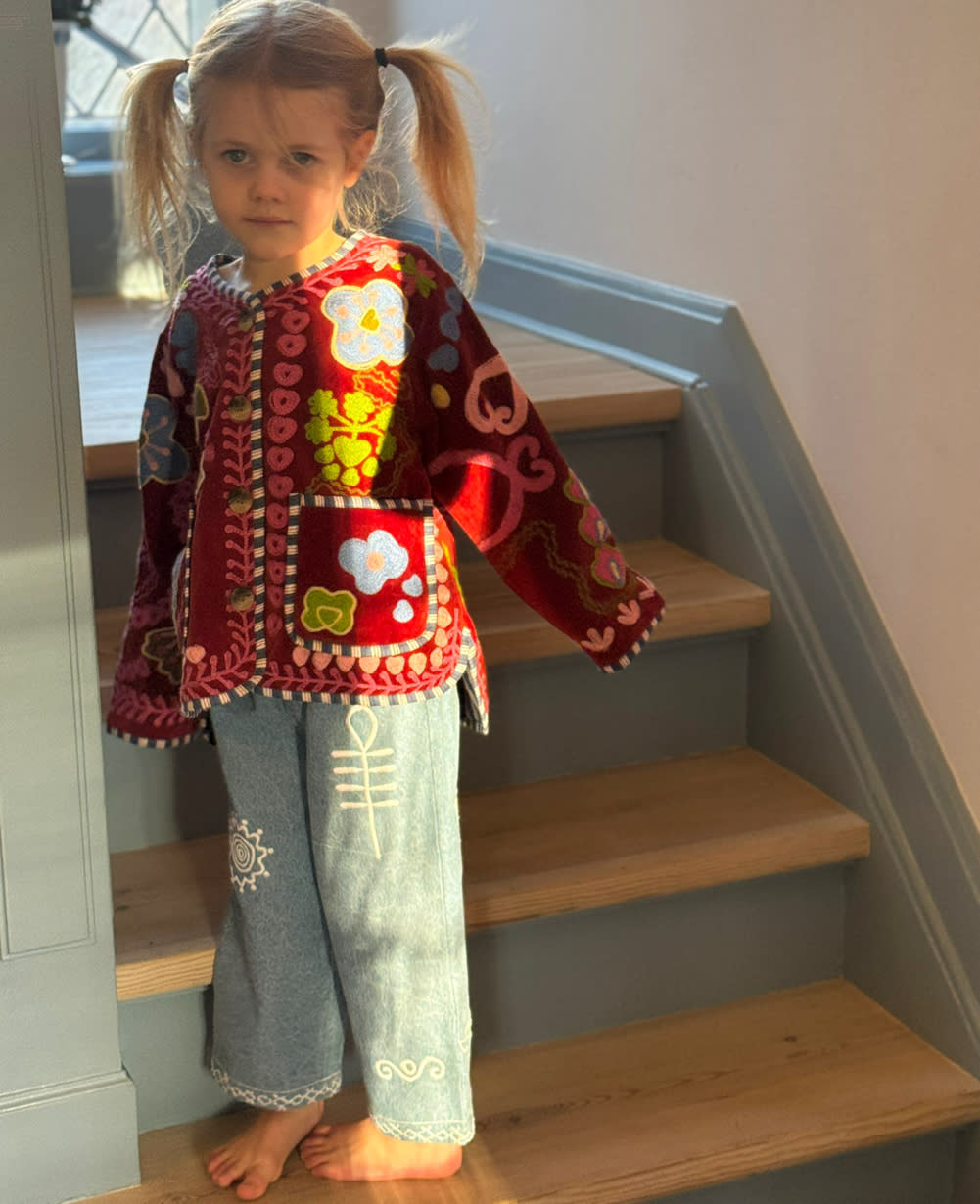 Sissel Edelbo Velvet Burgundy jacket styled with light trousers