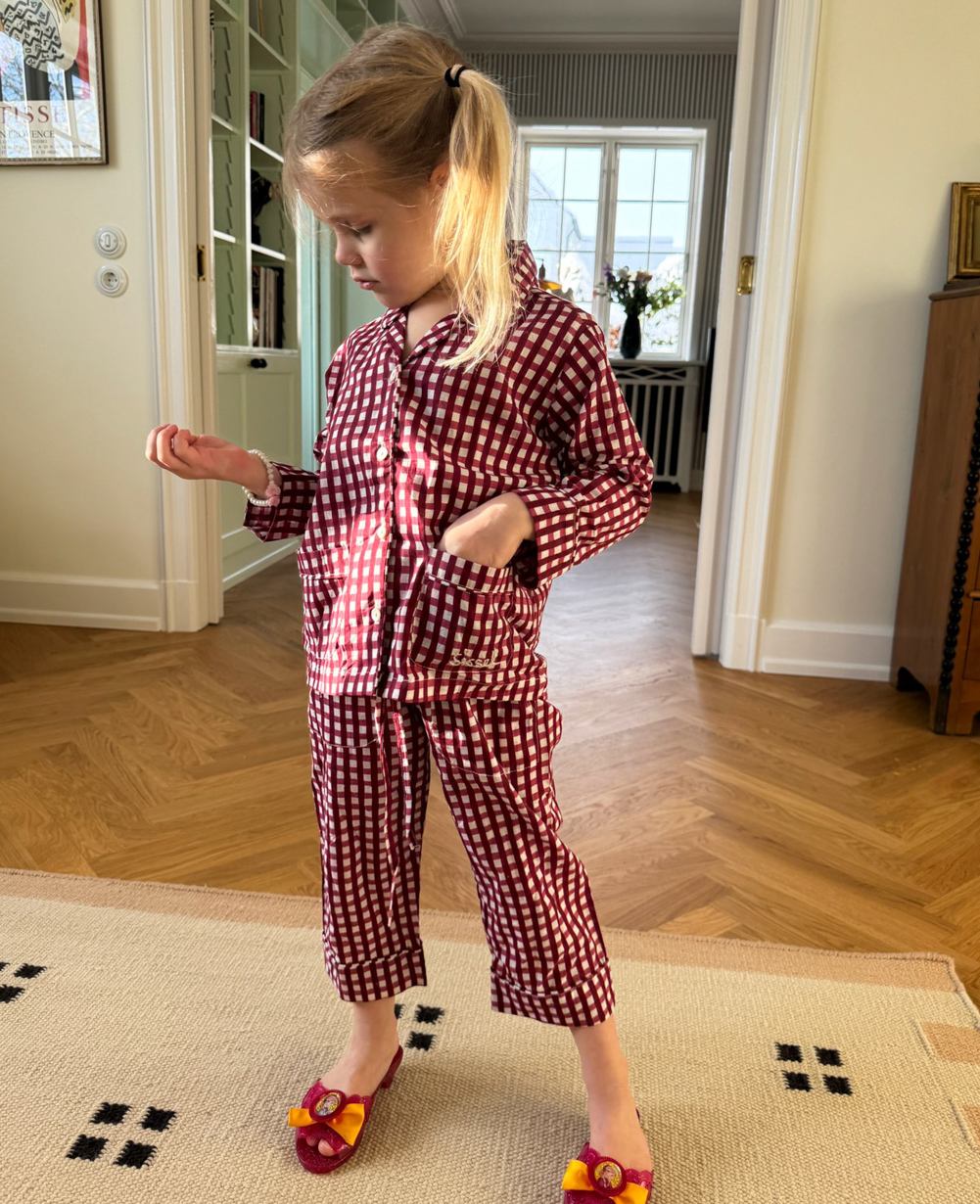 Sissel Edelbo Nuit MINI Berry Hedge shirt and pants worn indoors