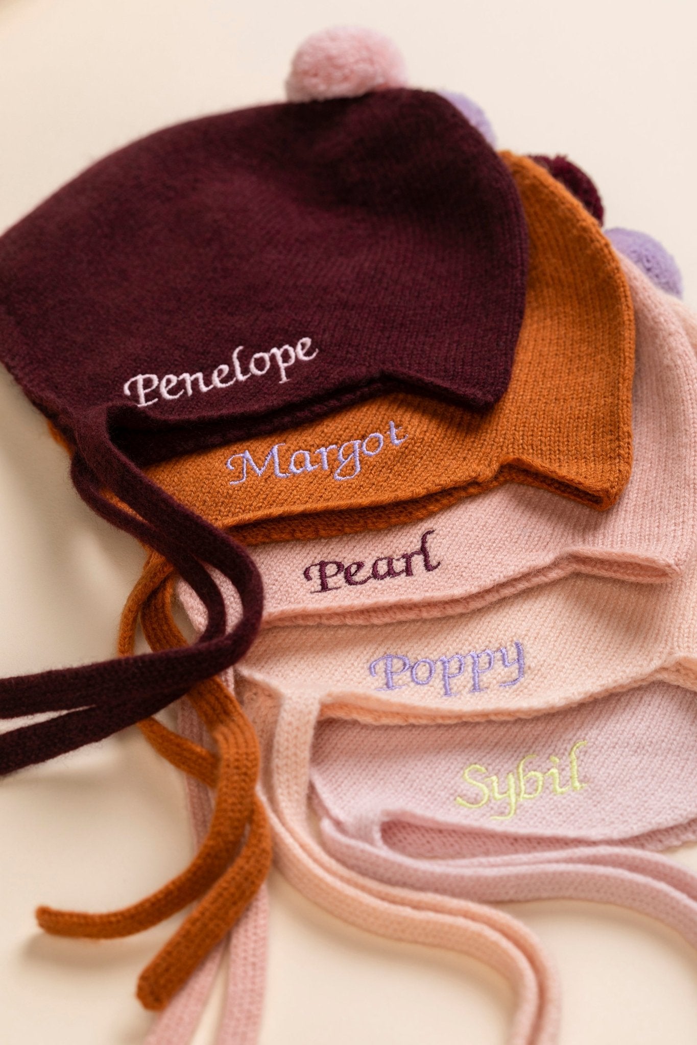 Cashmere Baby Bonnet, Kirsch with Marshmallow Pom - Pom Rosie Sugden