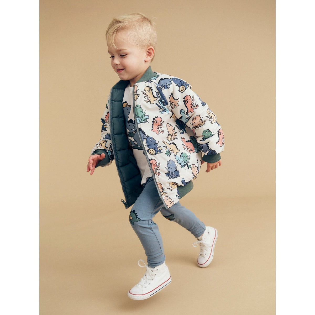 Huxbaby Adventure Dino pants, side view on a child