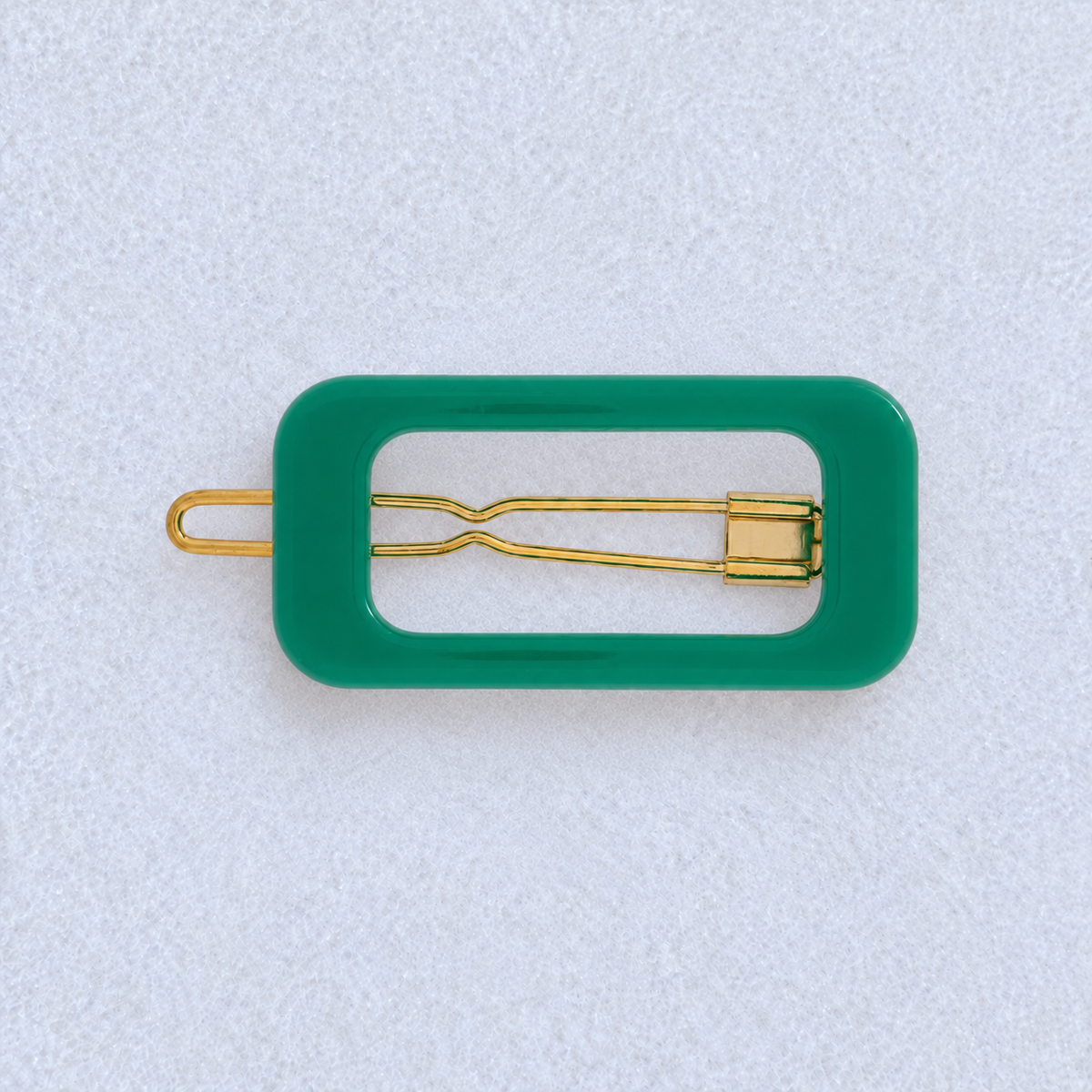 Kanel Rectangle Hair Clip – Green on a pale white textured fabric background