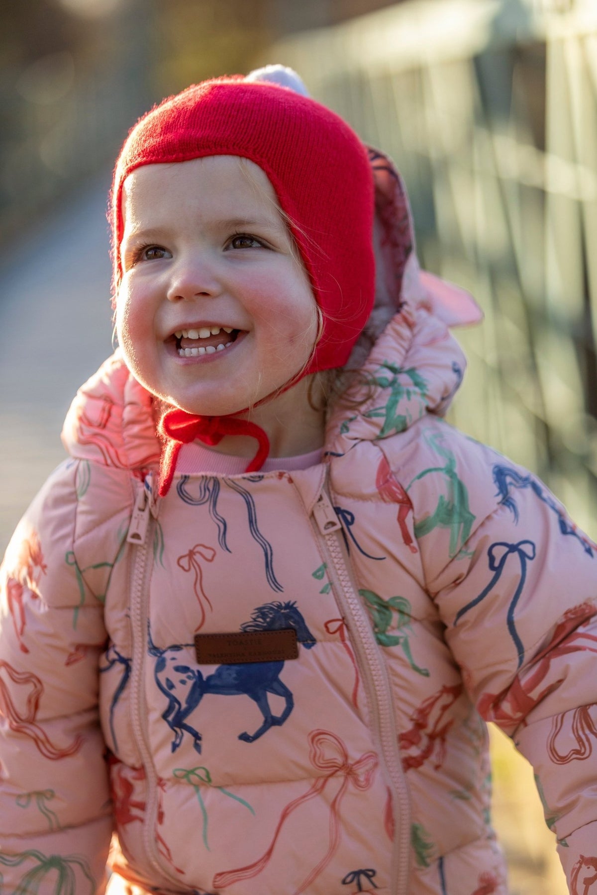 "My First Christmas" Cashmere Baby Bonnet, Festive Red with White Pom - Pom Rosie Sugden