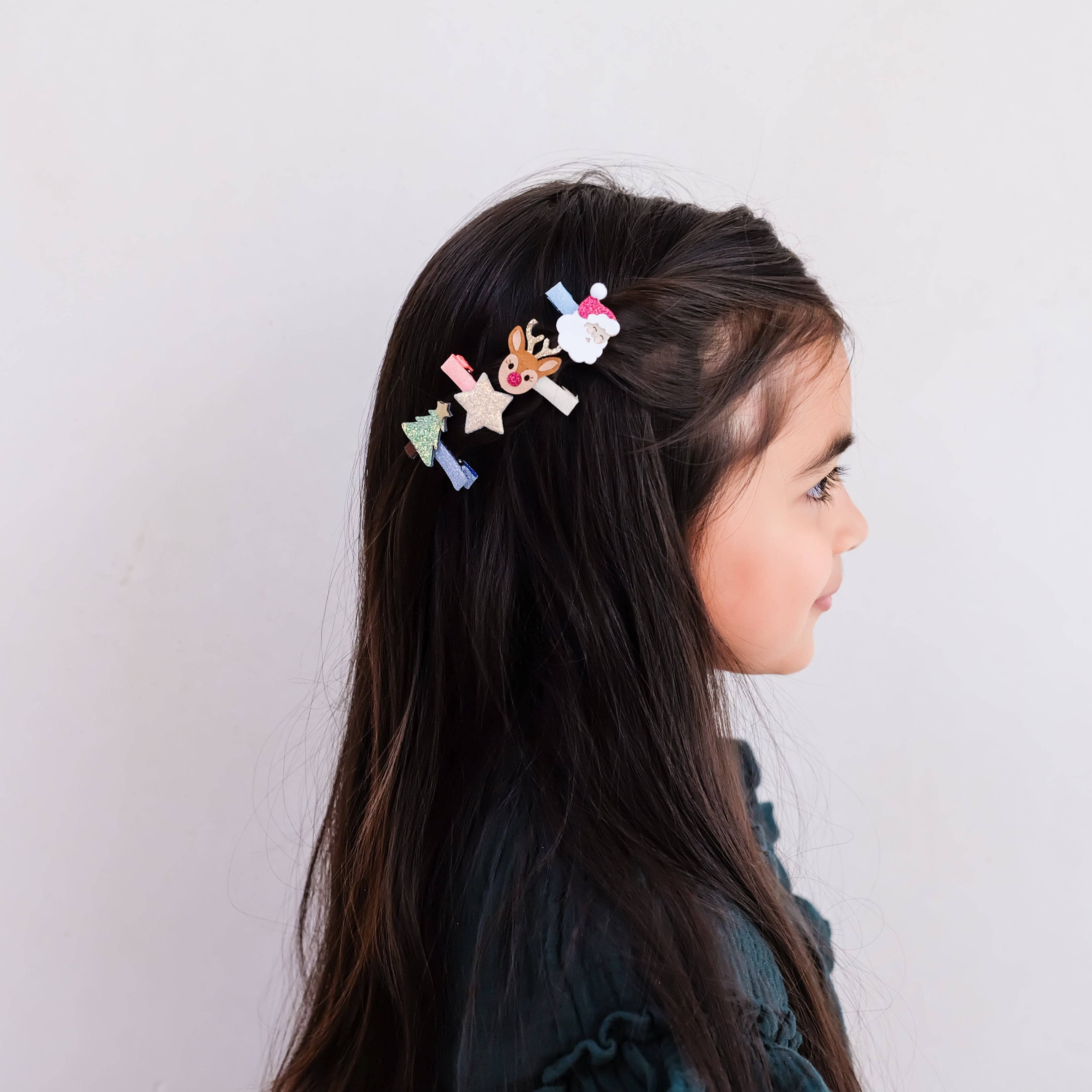 Christmas salon hair clips styled in a child&