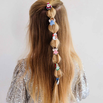 Christmas character hair ties styled in a braid
