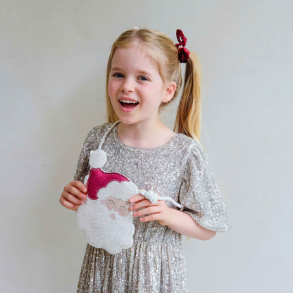 Mimi &amp; Lula Santa bag styled with festive accessories