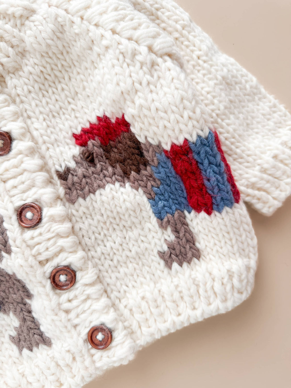 The Blueberry Hill Close-up of the dachshund motif and cardigan buttons