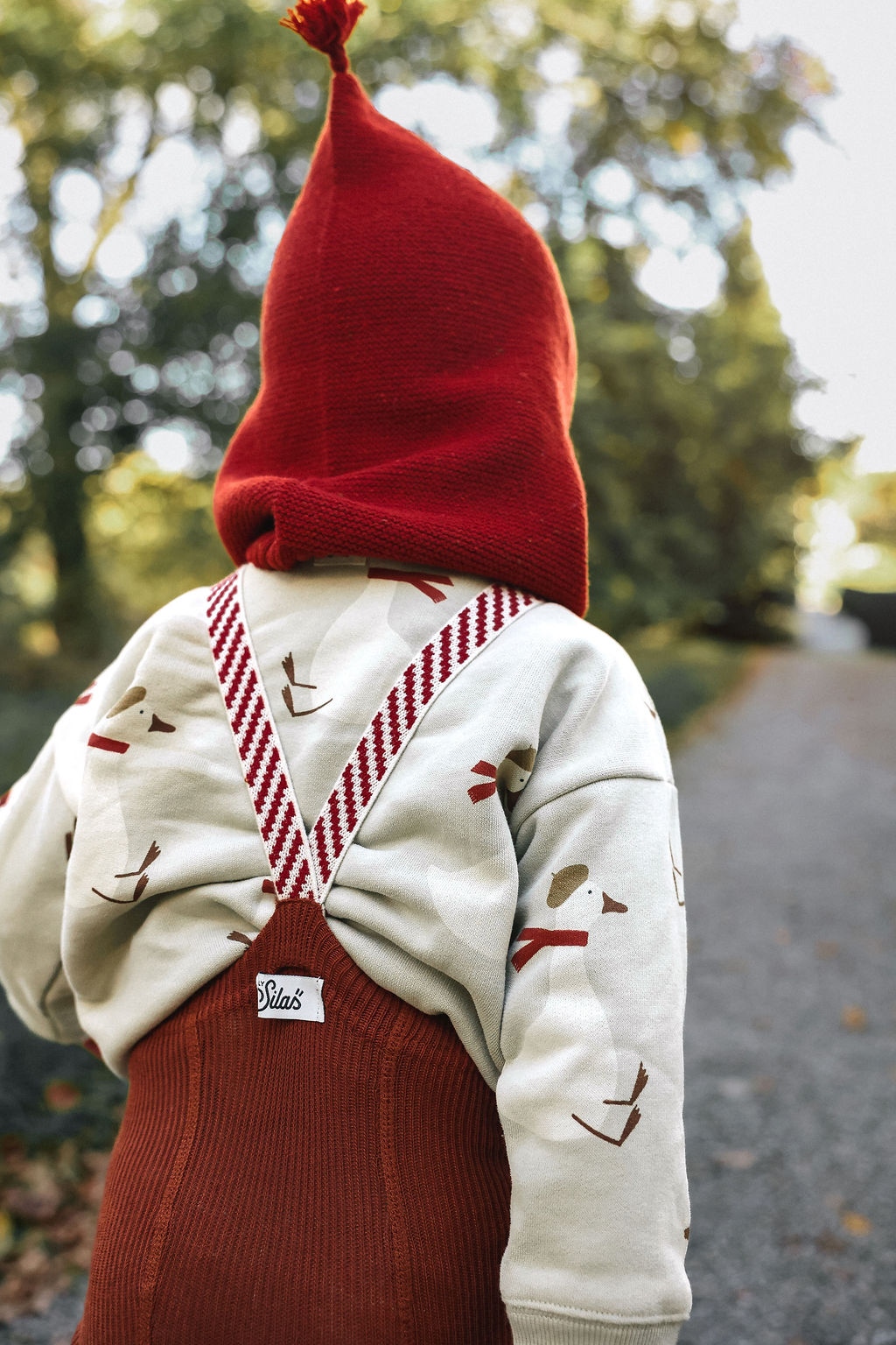 Silly Silas Footed Cinnamon Christmas Patterned — official lifestyle view 5