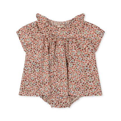 Floral baby romper on a white background