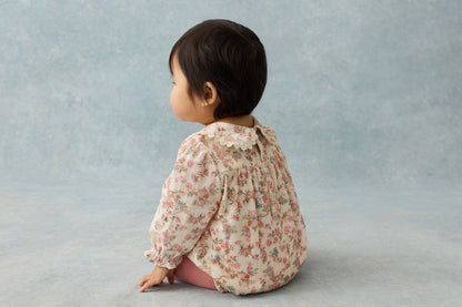 Louise Misha Chouchou Corduroy Romper in Cream, lifestyle view