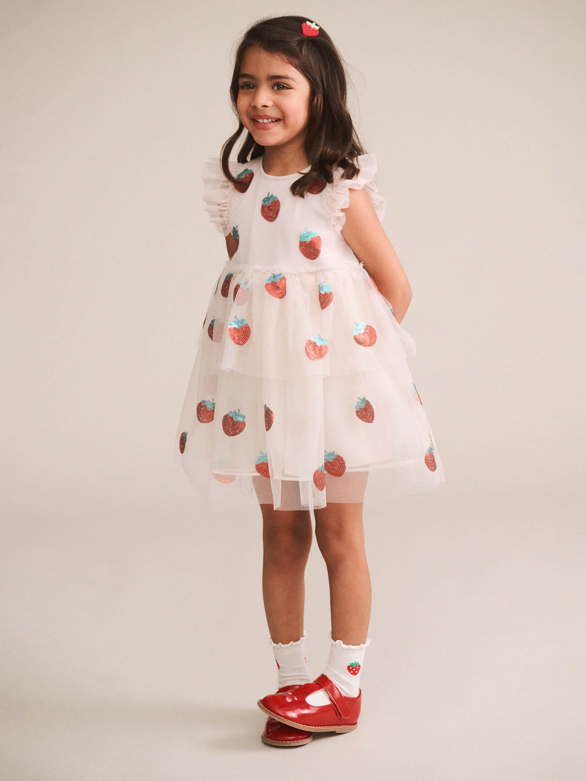 Huxbaby Sequin Strawberry Tulle Dress in Ecru, side lifestyle view