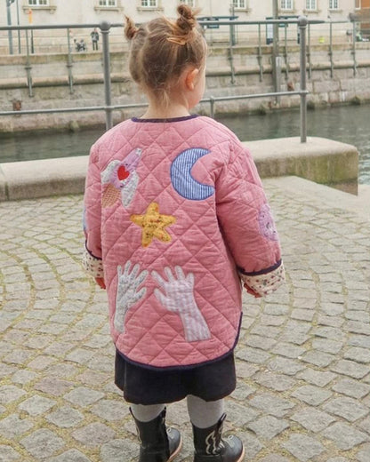 Sissel Edelbo back of the Cameo Pink jacket with moon and star appliqués
