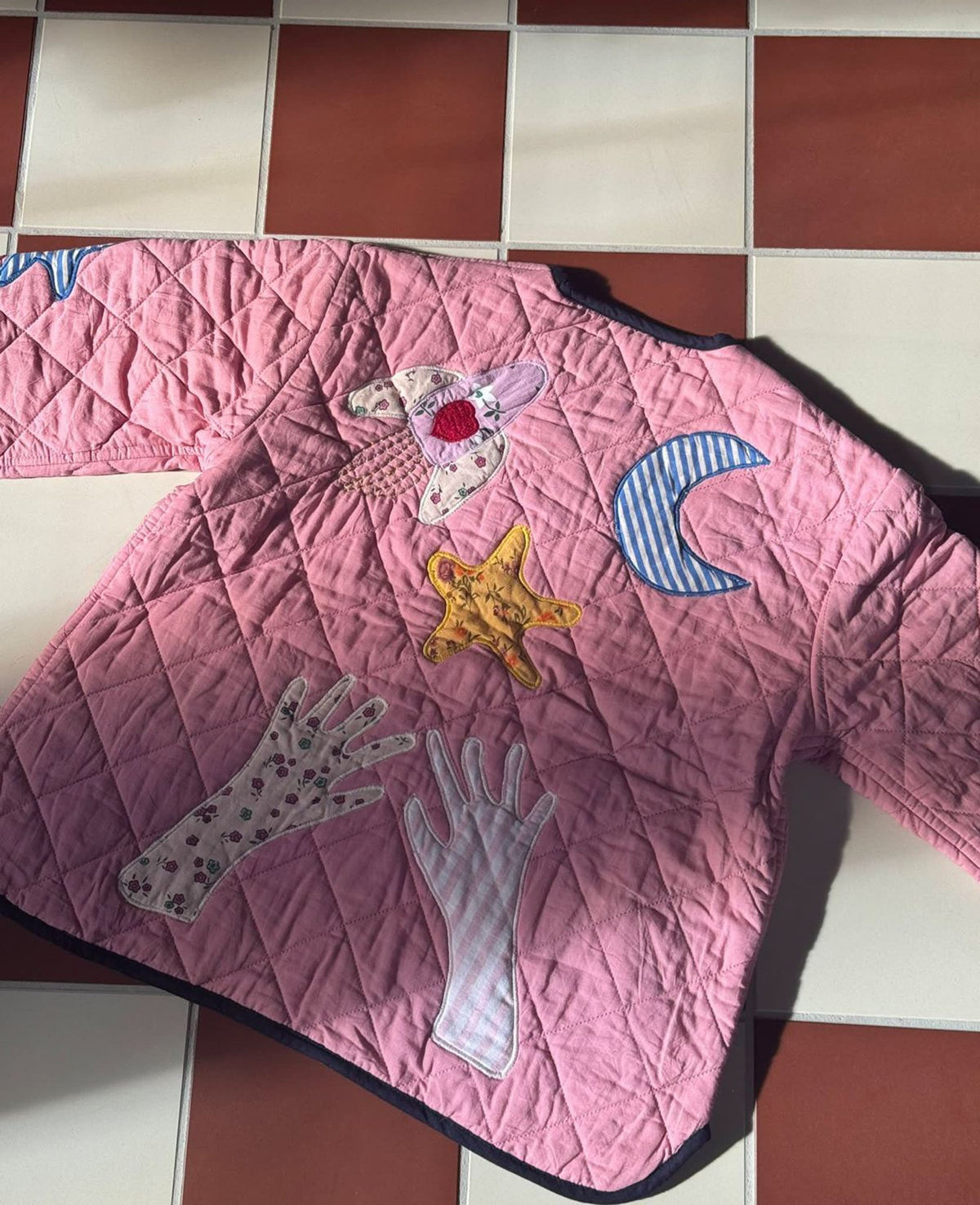 Sissel Edelbo close-up of square quilting and rocket appliqué