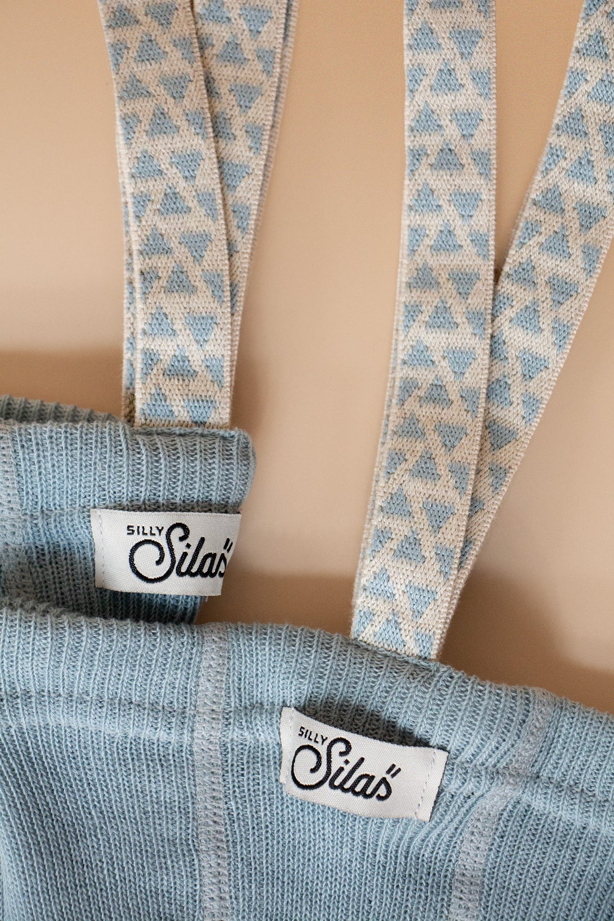 Silly Silas Close-up of Misty Blue ribbed knit and geometric patterned braces