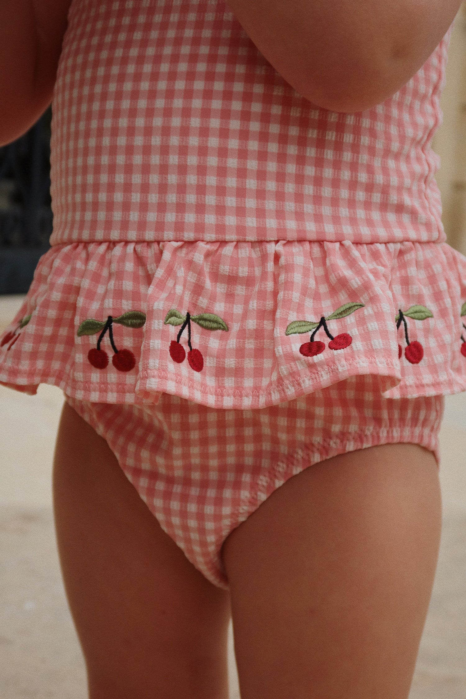 Geranium pink seersucker girls swimsuit by Konges Sløjd