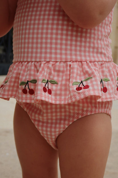 Geranium pink seersucker girls swimsuit by Konges Sløjd