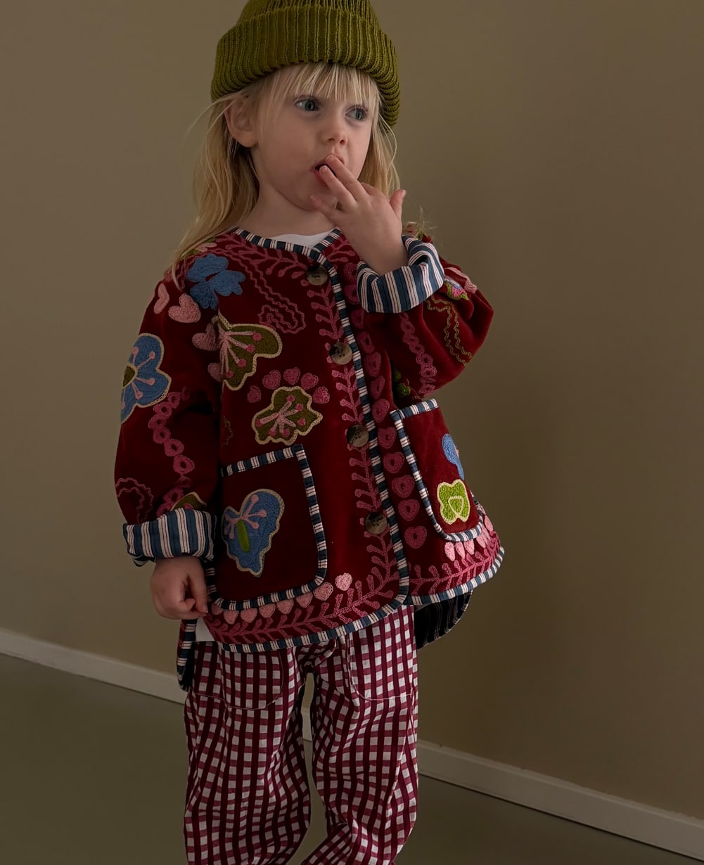 Sissel Edelbo Velvet Burgundy jacket styled with checked trousers