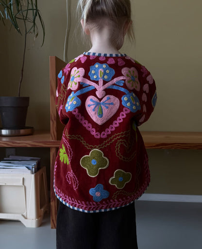Sissel Edelbo back view of the Velvet Burgundy embroidered jacket