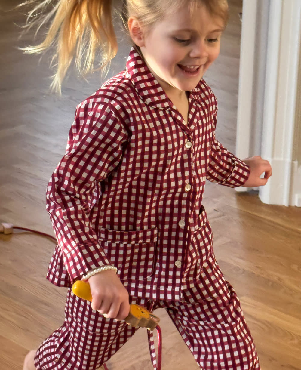Sissel Edelbo Nuit MINI red checked pyjamas front view while worn