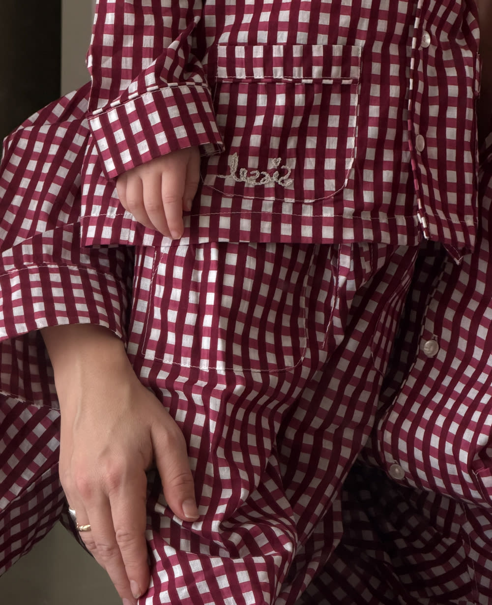 Sissel Edelbo close-up of the red checks and shirt pocket detail