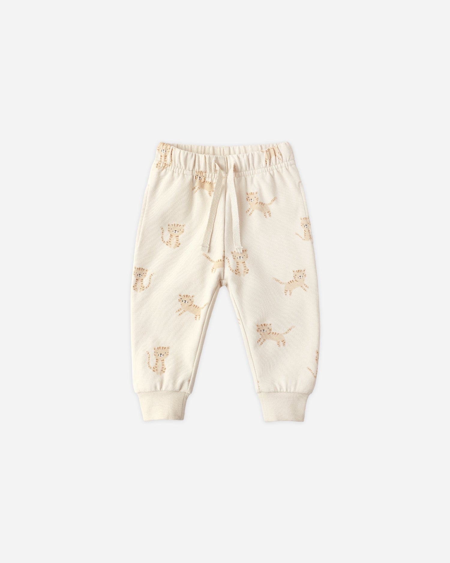 Cream-colored baby pants with a subtle pattern