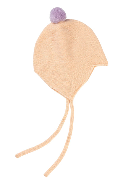 Rosie Sugden cashmere baby bonnet in Peach with Lupin pom