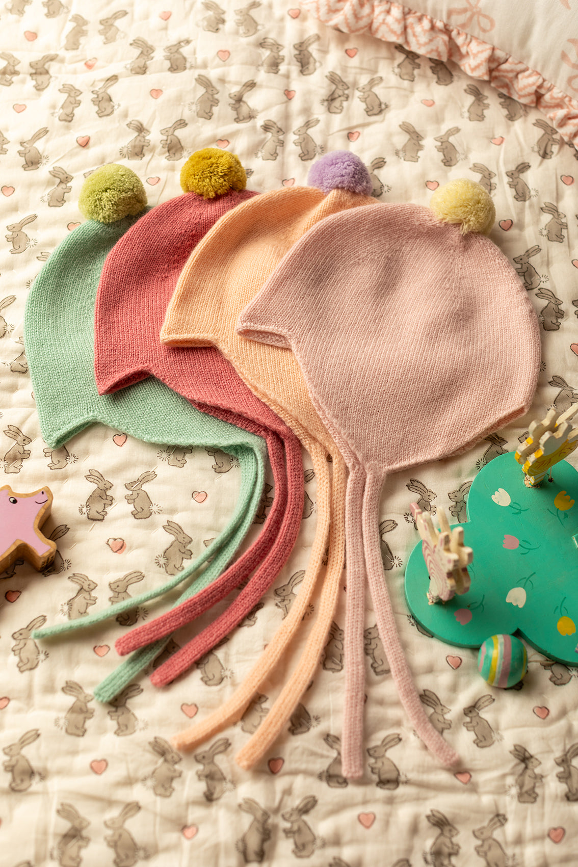 Rosie Sugden Peach and Lupin cashmere baby bonnet detail