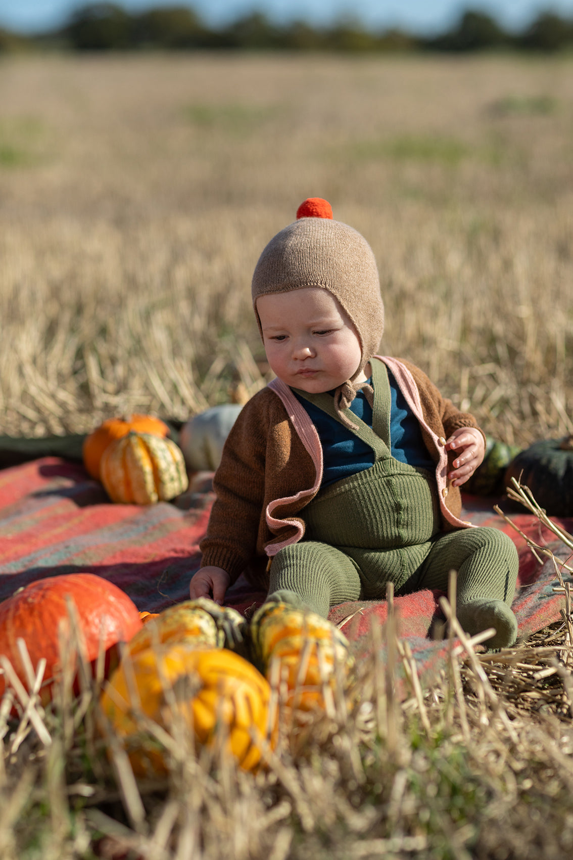 Rosie Sugden Mushroom cashmere baby bonnet lifestyle image