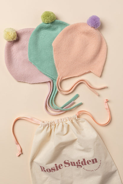 Rosie Sugden Peach cashmere baby bonnet gift image