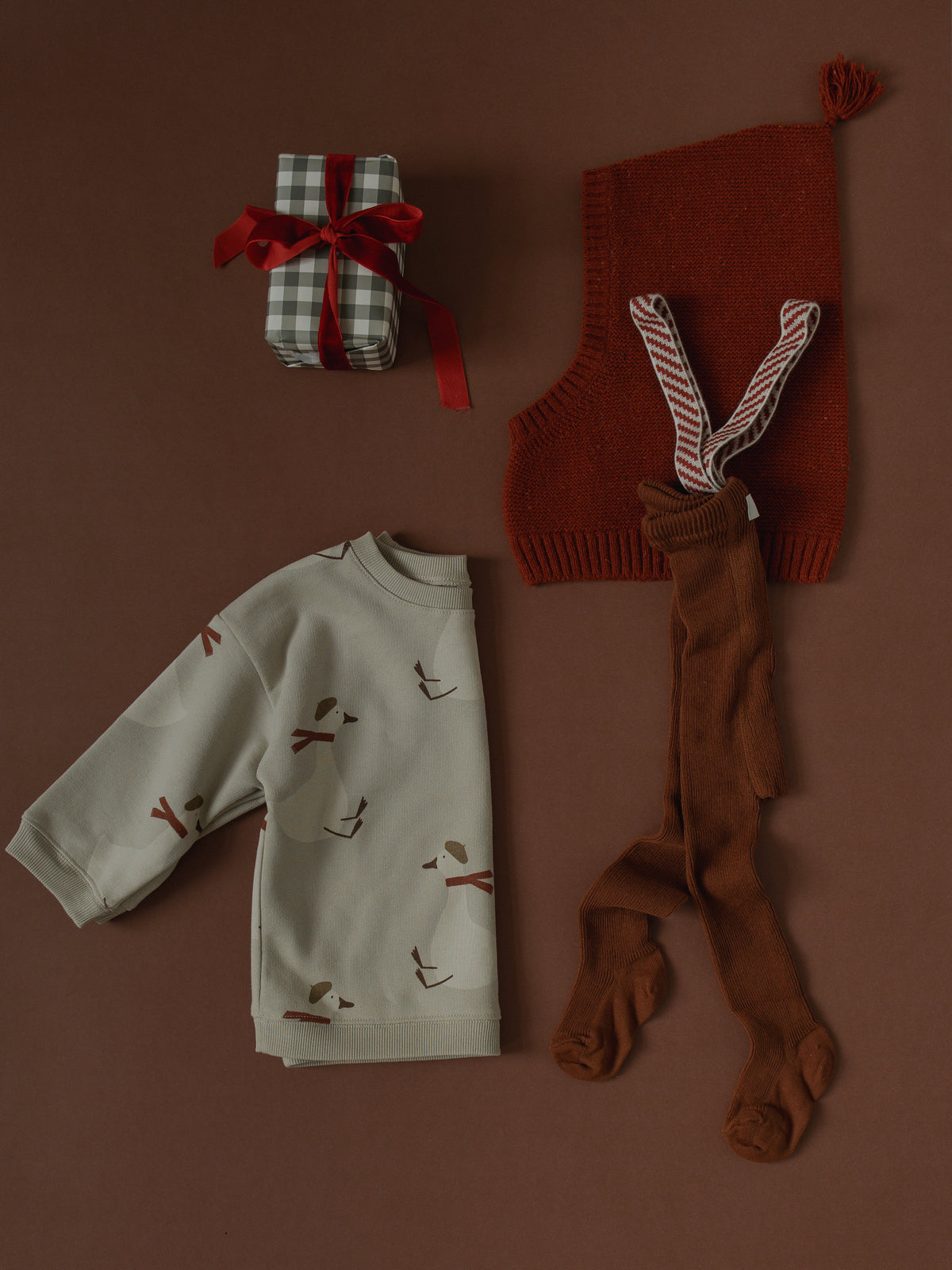Silly Silas Footed Cinnamon Christmas Patterned — official lifestyle view 2