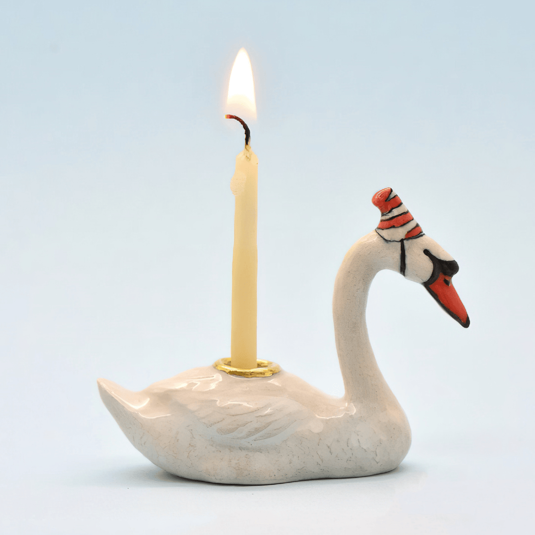 Camp Hollow Swan cake topper with birthday candle