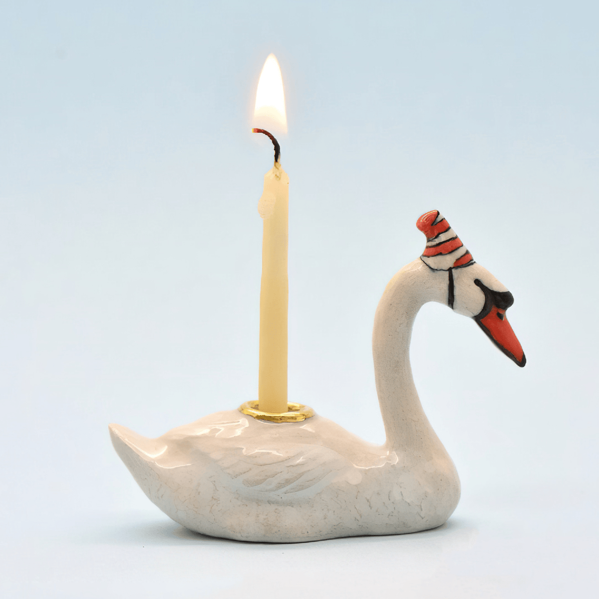 Camp Hollow Swan cake topper with birthday candle