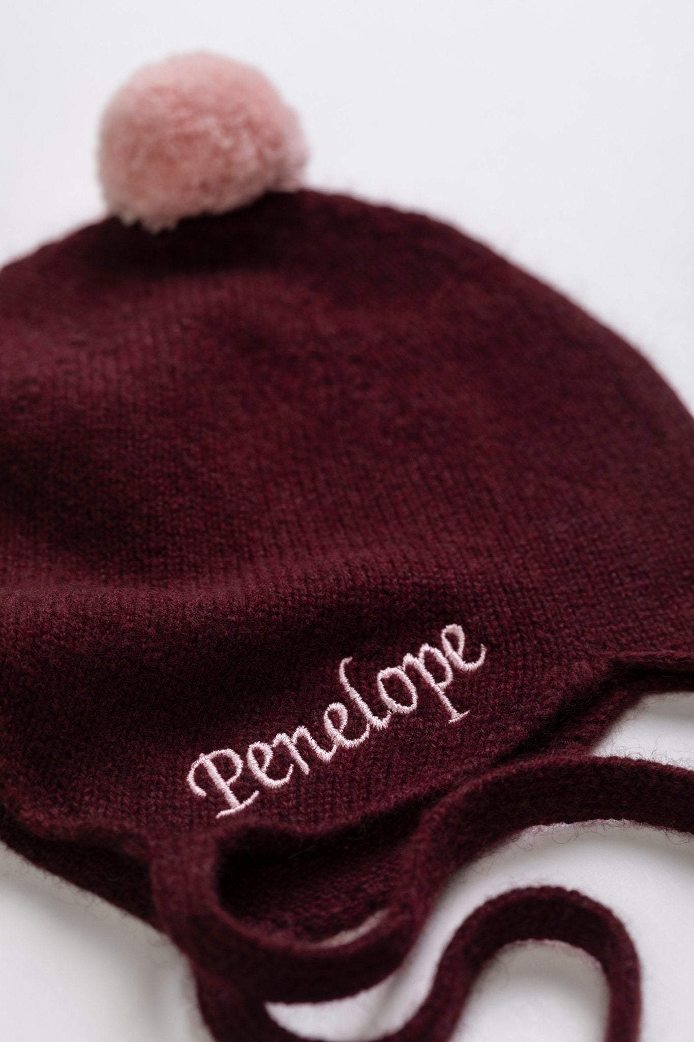 Cashmere Baby Bonnet, Kirsch with Marshmallow Pom - Pom Rosie Sugden