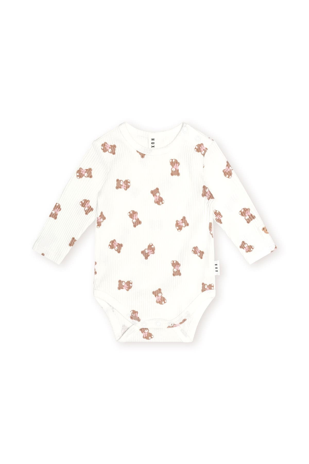 Huxbaby Tumbling Bow Huxette Long Sleeve Bodysuit in Almond Milk, front view