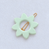 Kanel Anna Hair Clip – 566 on a unified pale grey-white fabric background