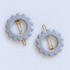 Kanel Daisy Hair Clip – Cool Grey on a unified pale grey-white fabric background