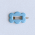 Kanel Fifi Hair Clip – 550 on a unified pale grey-white fabric background