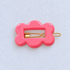 Kanel Fifi Hair Clip – 709 on a pale white textured fabric background