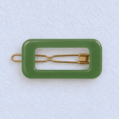 Kanel REC 354 rectangular hair clip in the merchant-approved reference green on a light fabric background