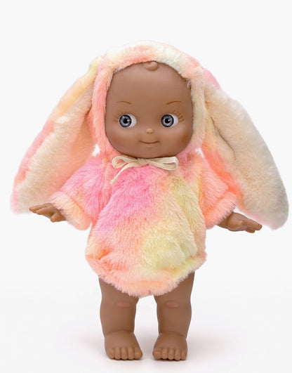 Minikane Maïa 27 cm Fantasia doll in a pink rainbow bunny outfit