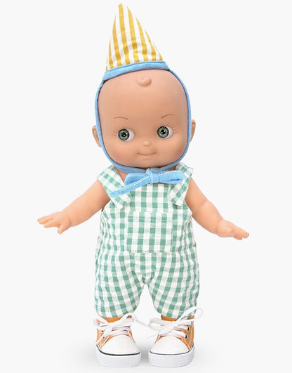 Minikane Zébulon Mini Panchas birthday doll in green gingham overalls