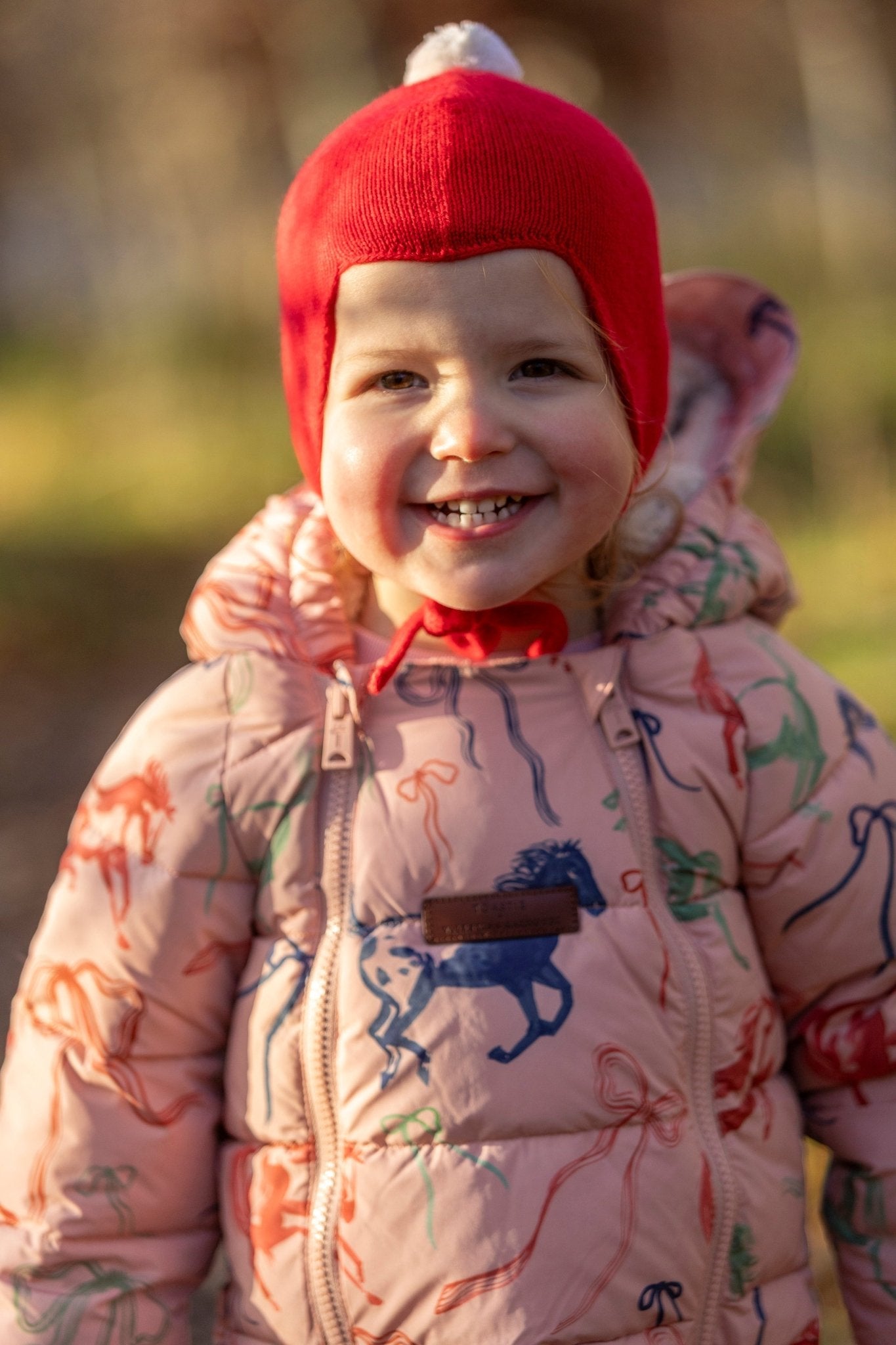 "My First Christmas" Cashmere Baby Bonnet, Festive Red with White Pom - Pom Rosie Sugden
