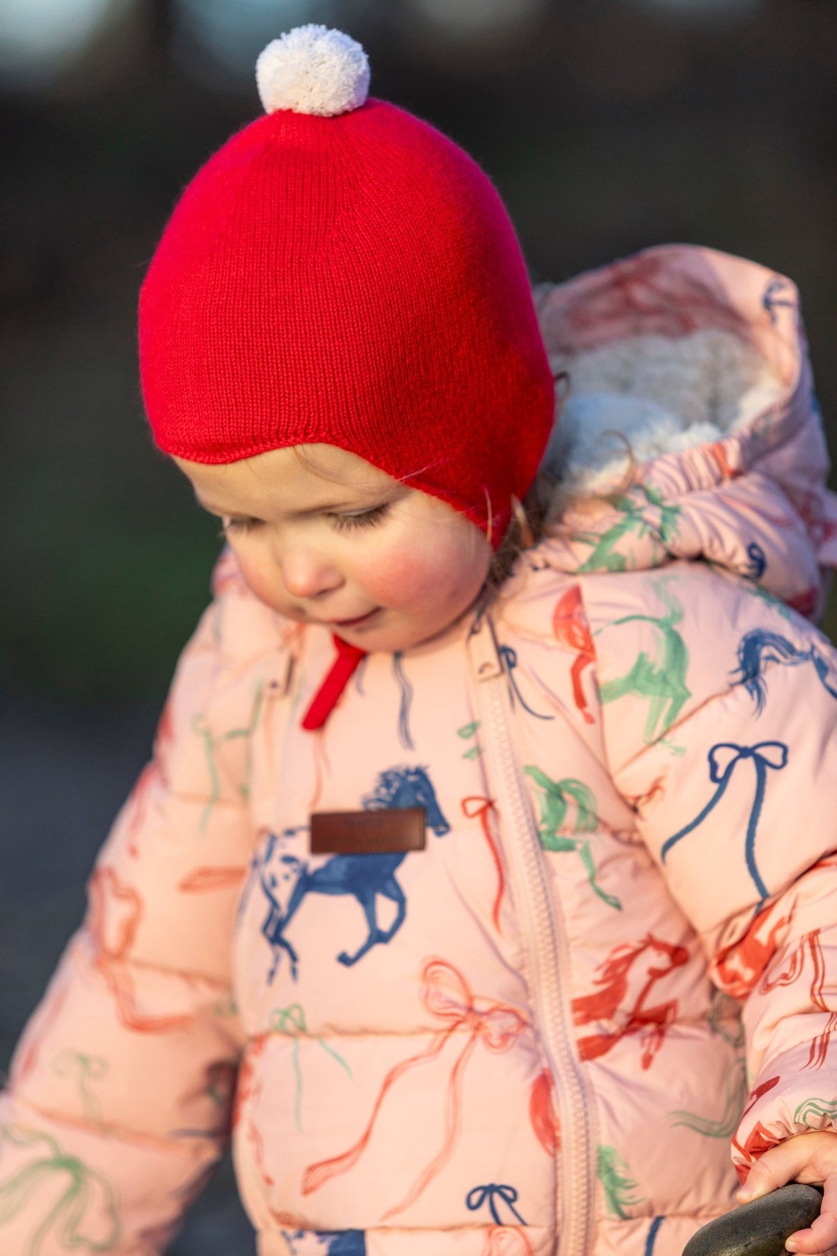 "My First Christmas" Cashmere Baby Bonnet, Festive Red with White Pom - Pom Rosie Sugden