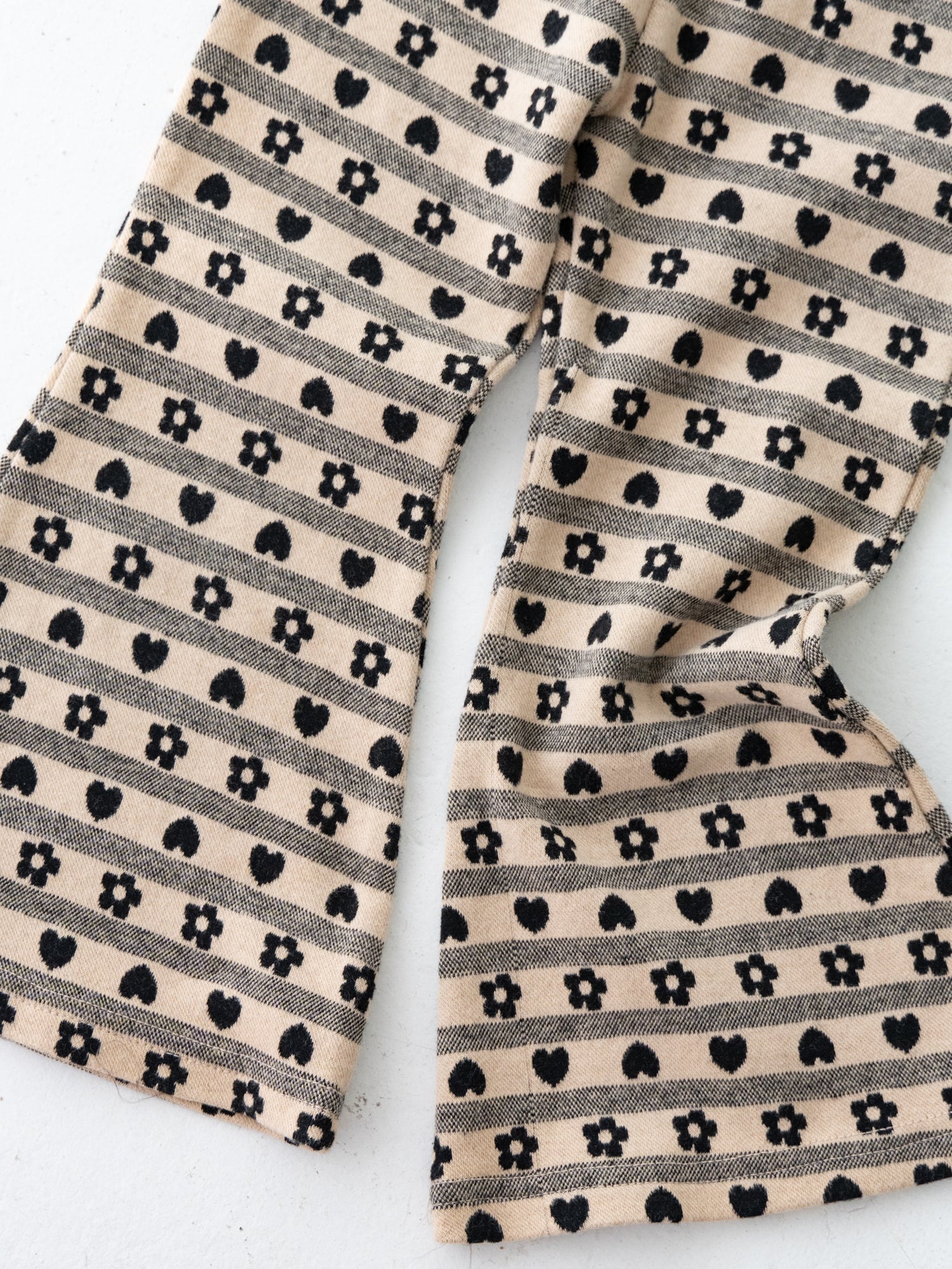 Pippi+Lotta Flower Flare Heart Printed Pants Beige Black Pippi+Lotta