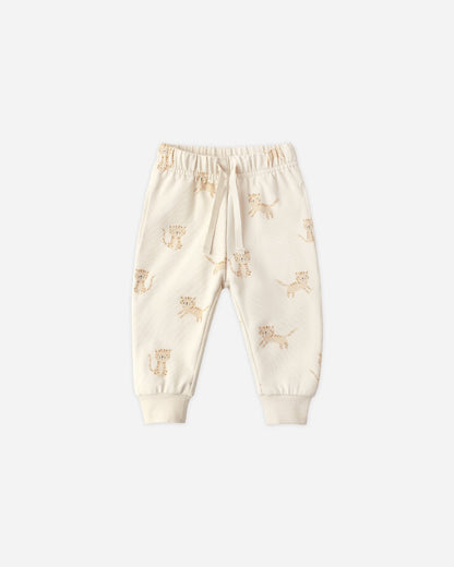 Cream-colored baby pants with a subtle pattern