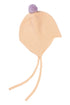 Rosie Sugden cashmere baby bonnet in Peach with Lupin pom
