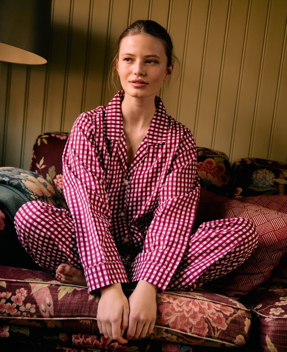 Sissel Edelbo adult Berry Hedge pyjamas worn while seated