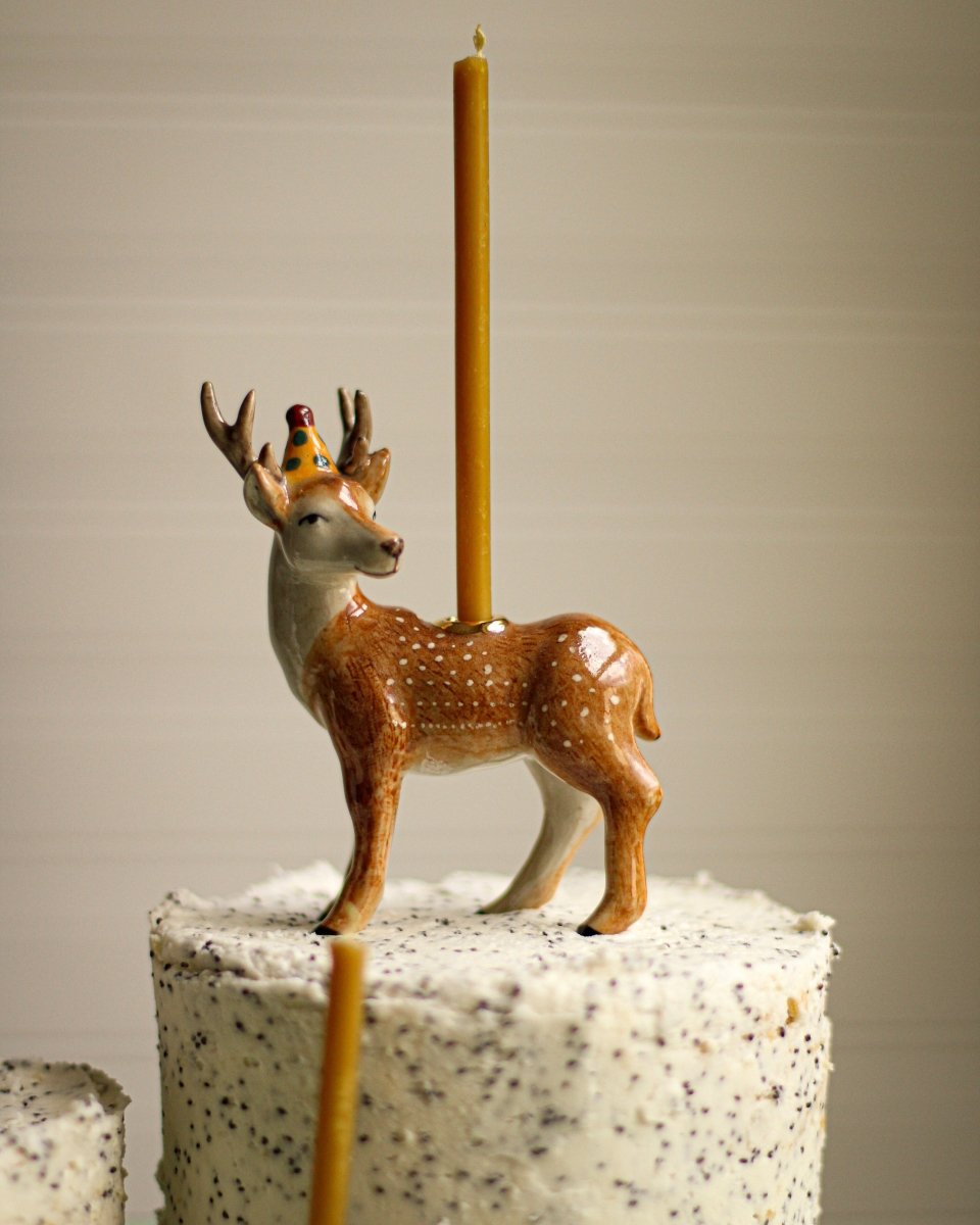 Celebrate birthdays with the Camp Hollow Dachshund Birthday Candle Holder. A hand-painted porcelain cake topper and candle holder, perfect for dog lovers, puppy-themed parties, keepsake gifts, and special celebrations at EnjoyKids Boutique.